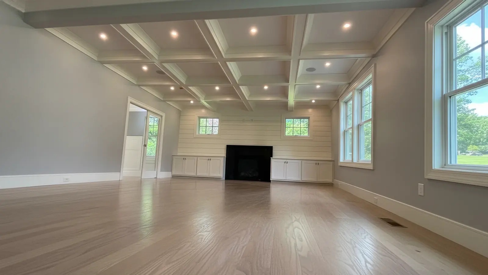 Living room with painted coffered ceiling